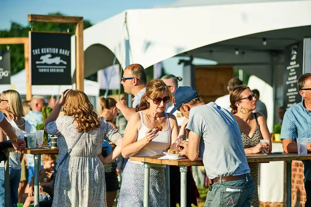 People eating food at Pub In The Park Marlow
