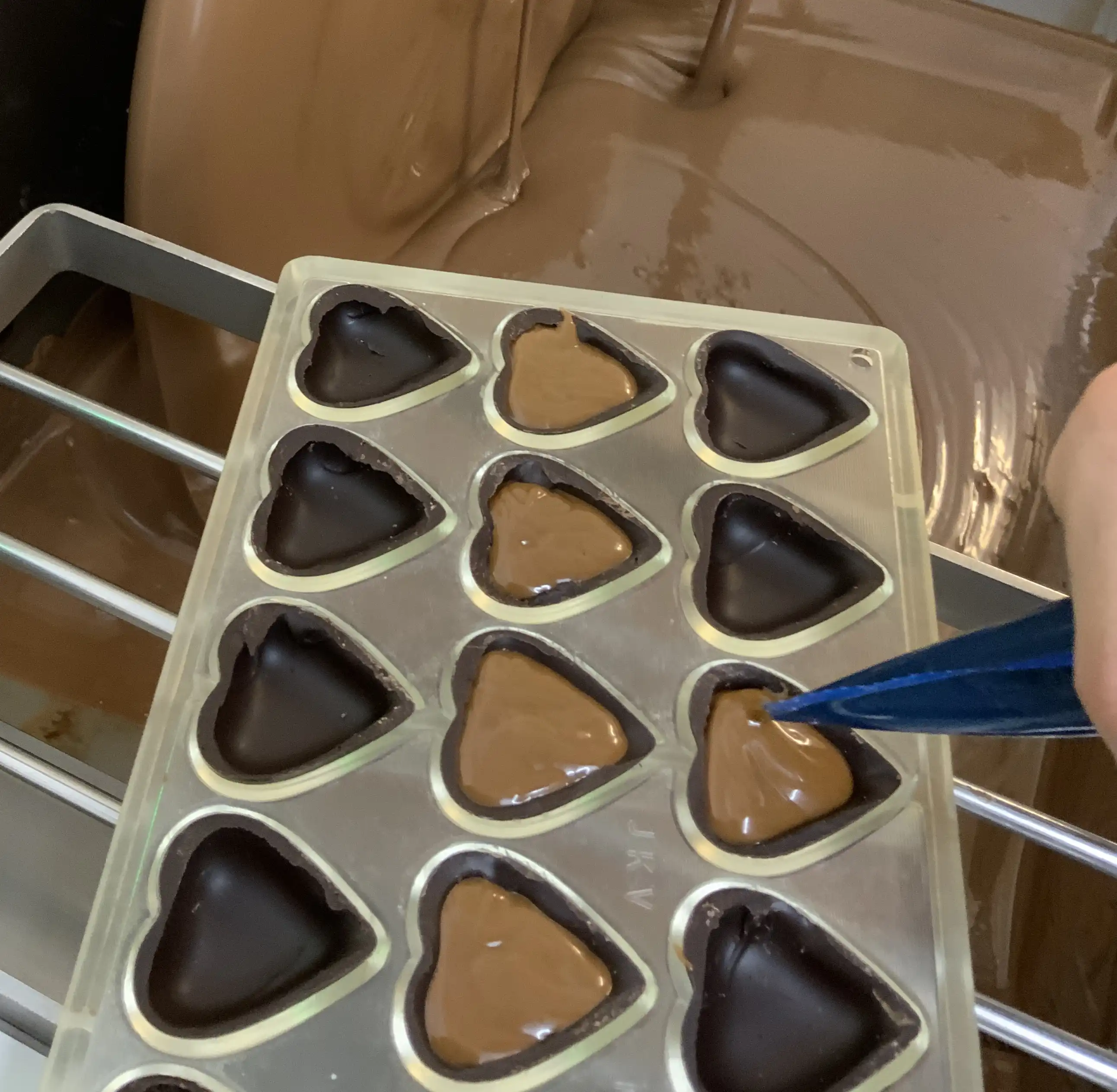 The creation process of chocolate hearts