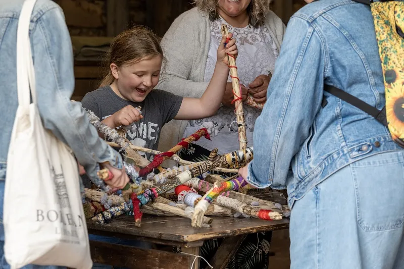 A family creating a community sculpture at Bucks Culture Open Weekend